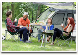 Image of family grilling in backyard